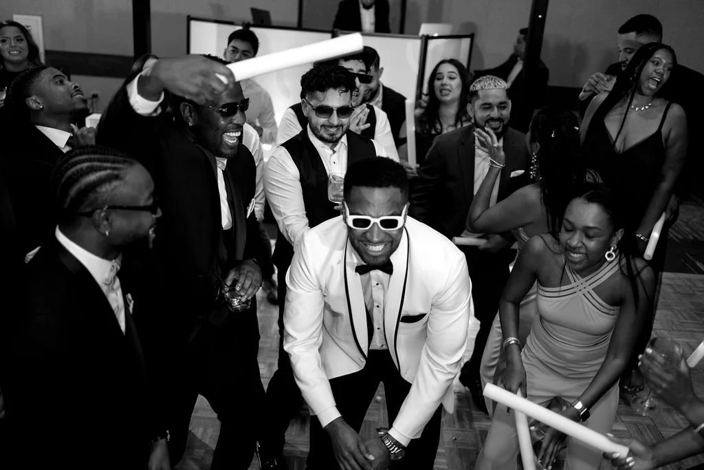 Wedding guests celebrating during a bilingual wedding reception in Chicago