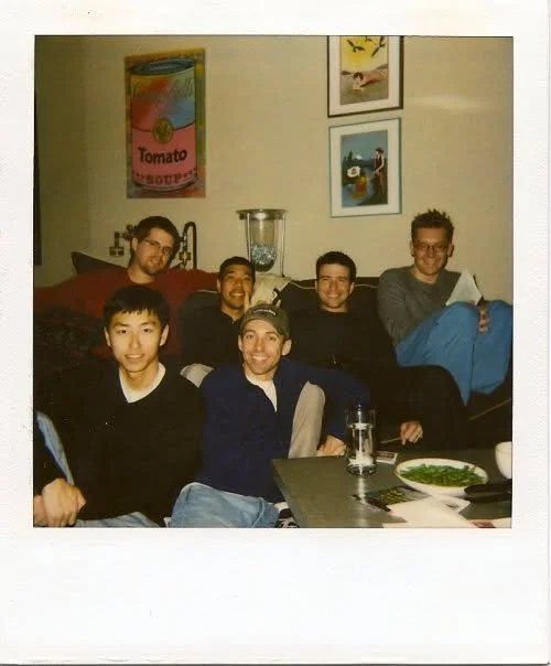 six handsome gents on a sofa