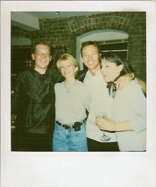 four people at a party