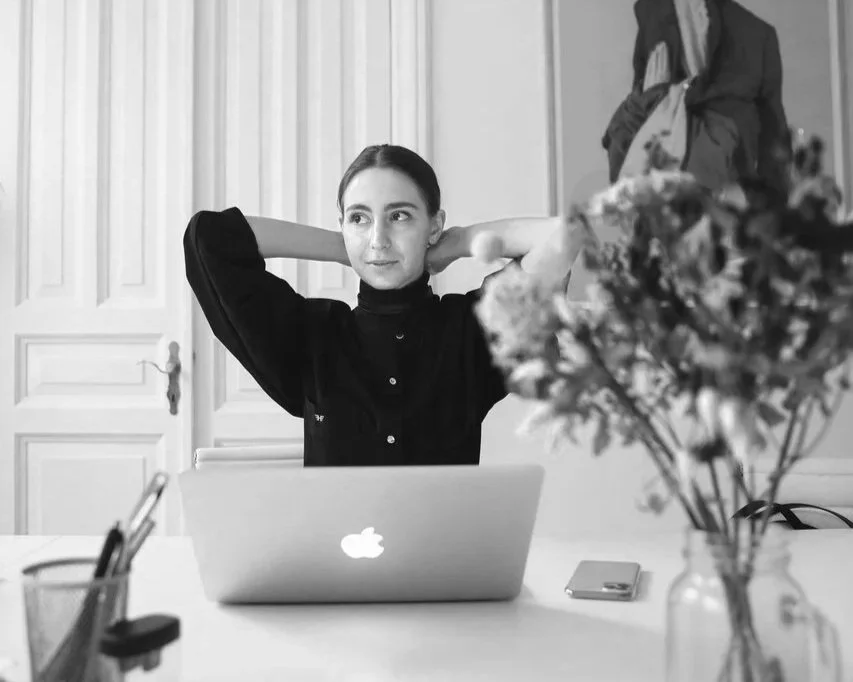 womanindeepthoughtatherdesk
