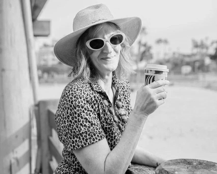 woman-wearing-sunglasses-smiling-drinking-coffee-rtt-hypnotherapy-self-doubt