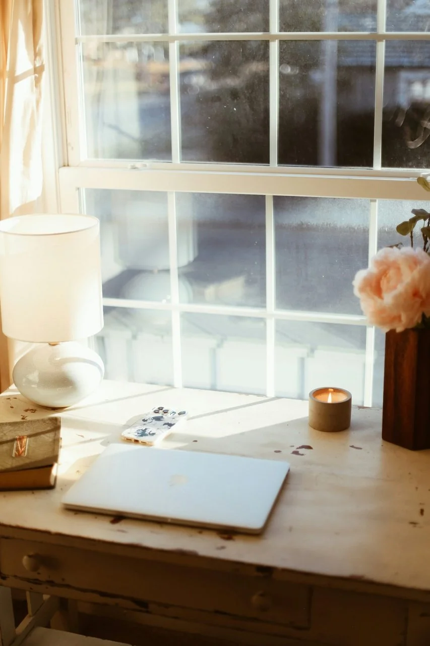 desk next to window natural soft light mariachristiehypnotherapy