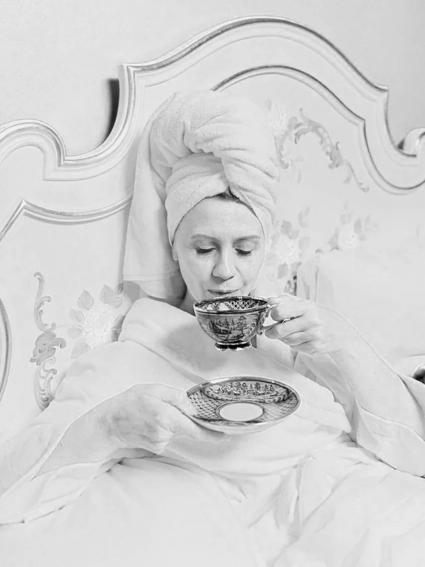womanreclininginbedwithtea
