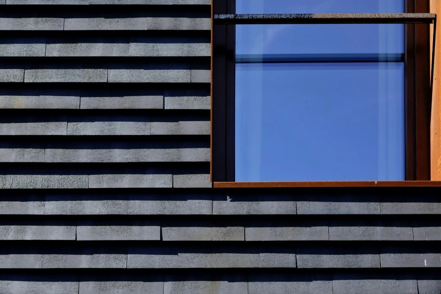 FORMA brick cladding. Extruded European clay tiles engineered for ventilated facade and roof systems. #formafacade #keelarchitectural