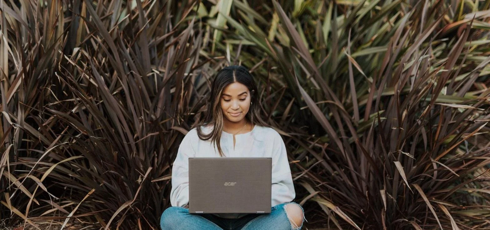 Sunlit laptop video call representing a virtual therapy intensive session
