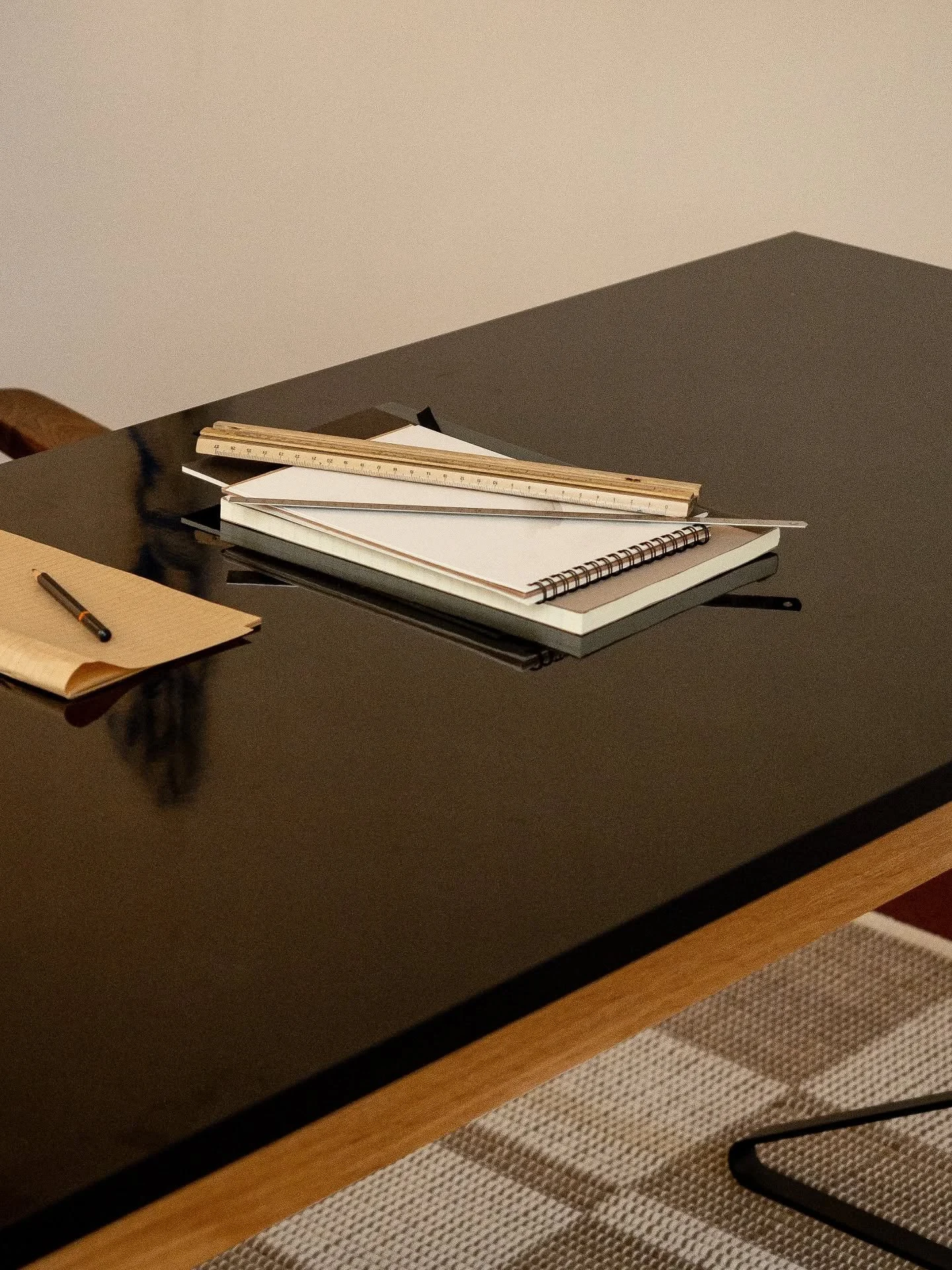 A close-up of an unintentional writing setting. In reality, every paper and pencil is carefully staged by the designer.

Just gazing at this scene, my mind starts to flow. Imagine the sound of a pencil scraping against notebook paper, capturing all t