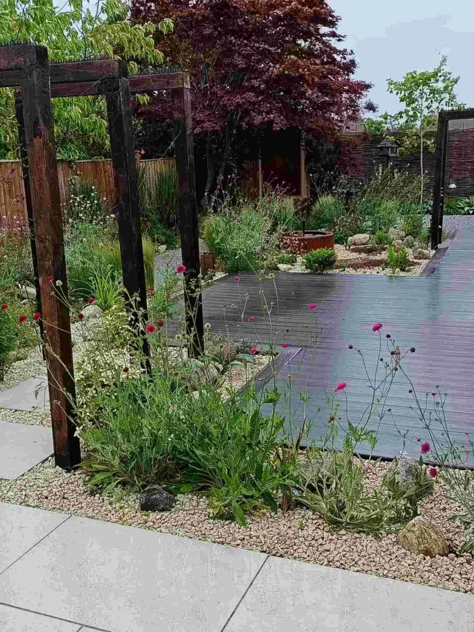 Full garden design and installation in Sydney, Crewe with composite decking and porcelain paving plus much much more!