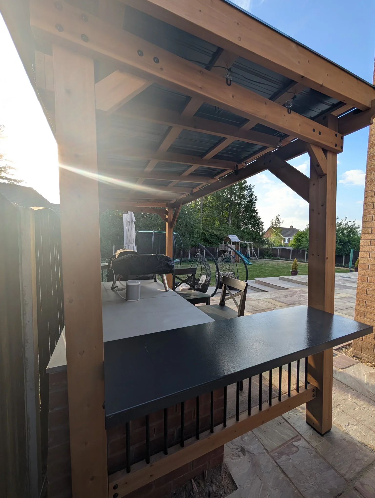 Outdoor patio area with outdoor kitchen in Alsager