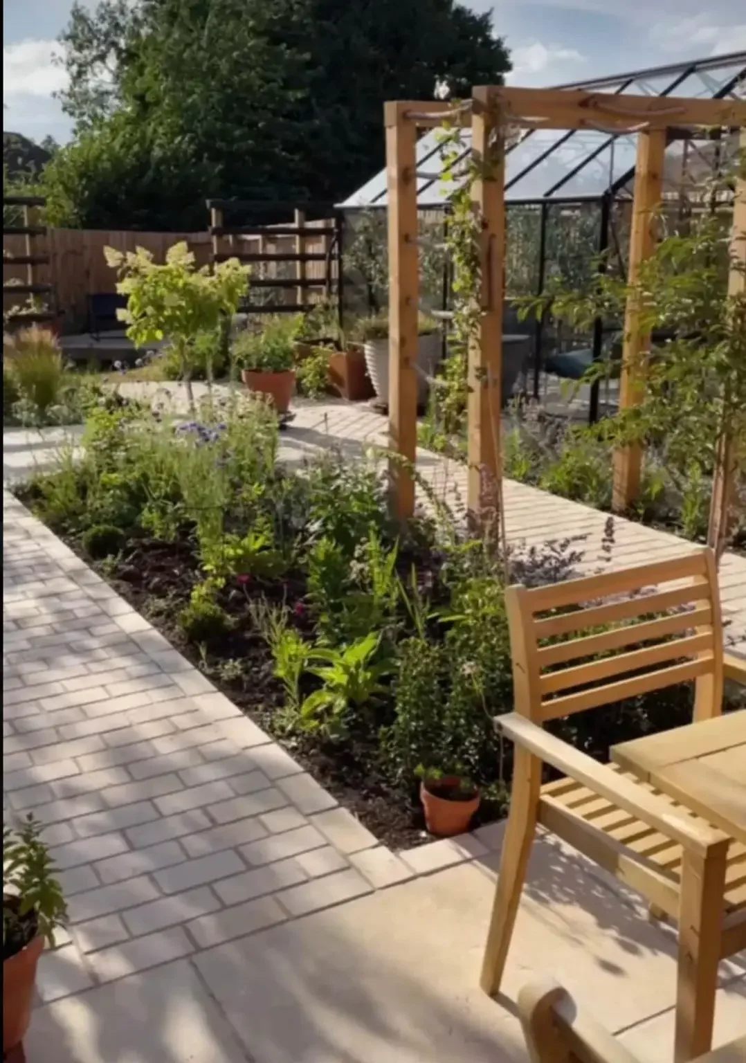 New build garden design and makeover near Crewe with Egyptian limestone paving installation 