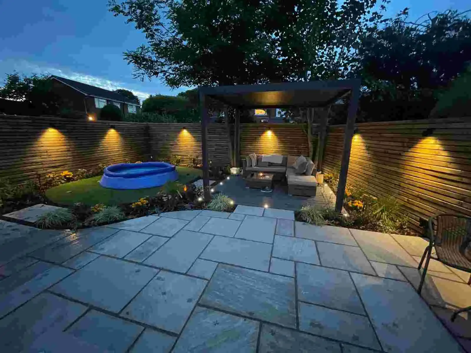 Full garden transformation with fence lighting and deck lighting in Sandbach