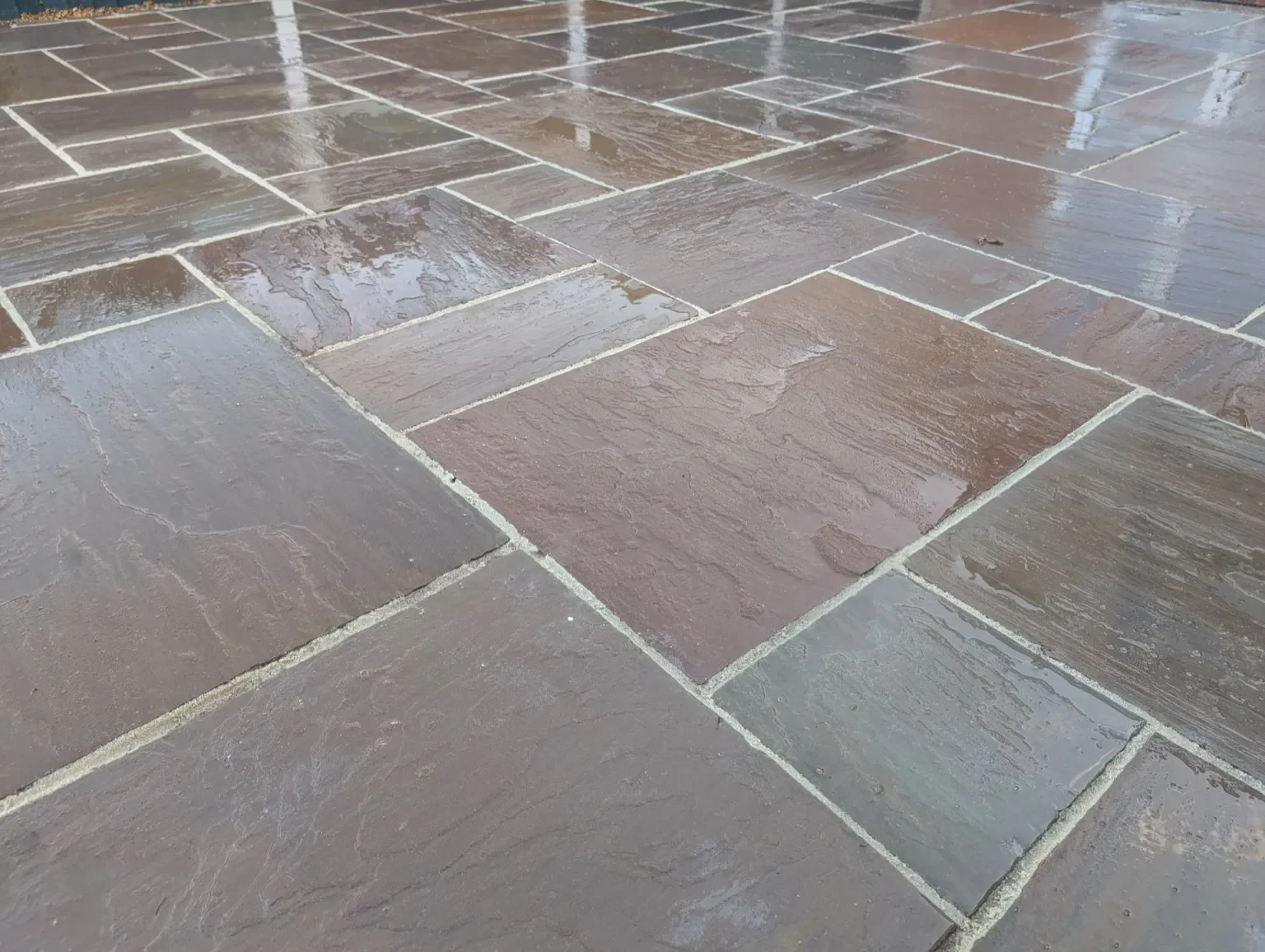 Raj blend Indian sandstone paving installed in Haslington, Crewe.
