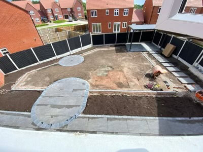 A new build garden on broad meadow park in sandbach during landscaping with bespoke porcelain paving