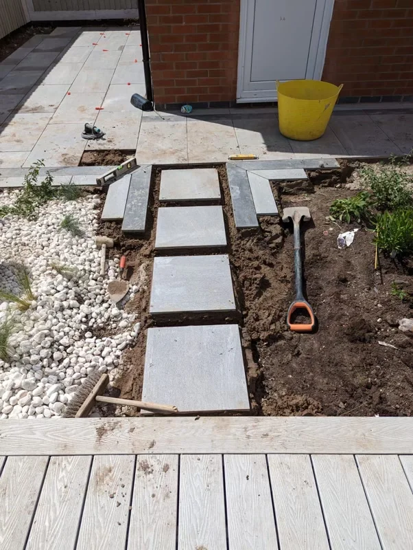 Construction of bespoke porcelain paving during install by Goodwin Gardens in Trentham, Stoke-on-Trent