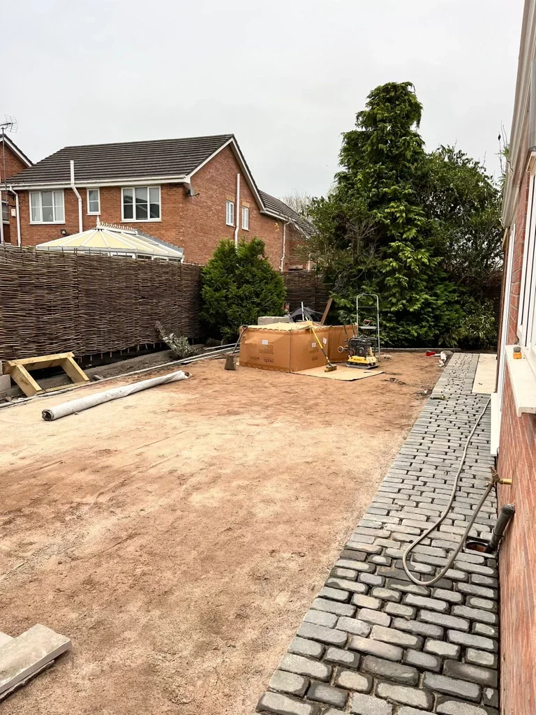 During full garden transformation, with construction in progress of a garden in Leighton, Crewe.