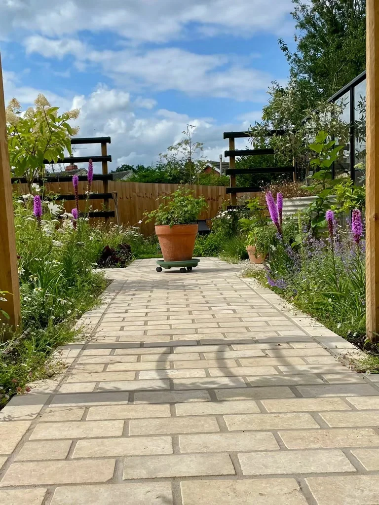 Egyptian limestone pathway installed within a design and build landscaping project by Goodwin Gardens Ltd