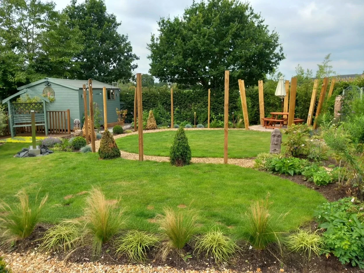 Finished full garden landscaping with winding pathway, outdoor lighting and lawns in Haslington, Crewe