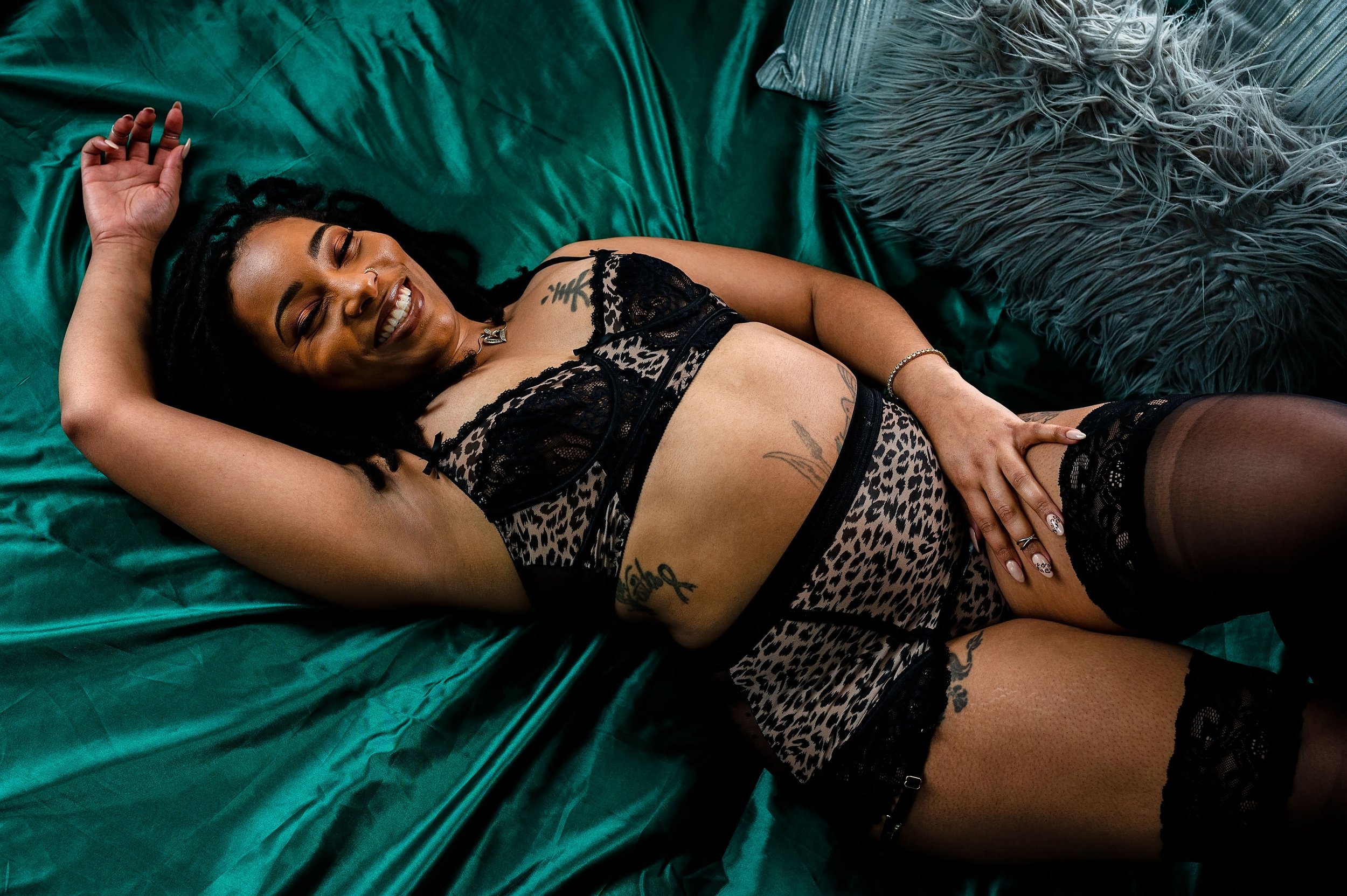  Top Boudoir photographer in Louisville, Kentucky for women and couples.  Black Female Photographer Chanel Nicole specializes in photographing women to help them feel confident. 