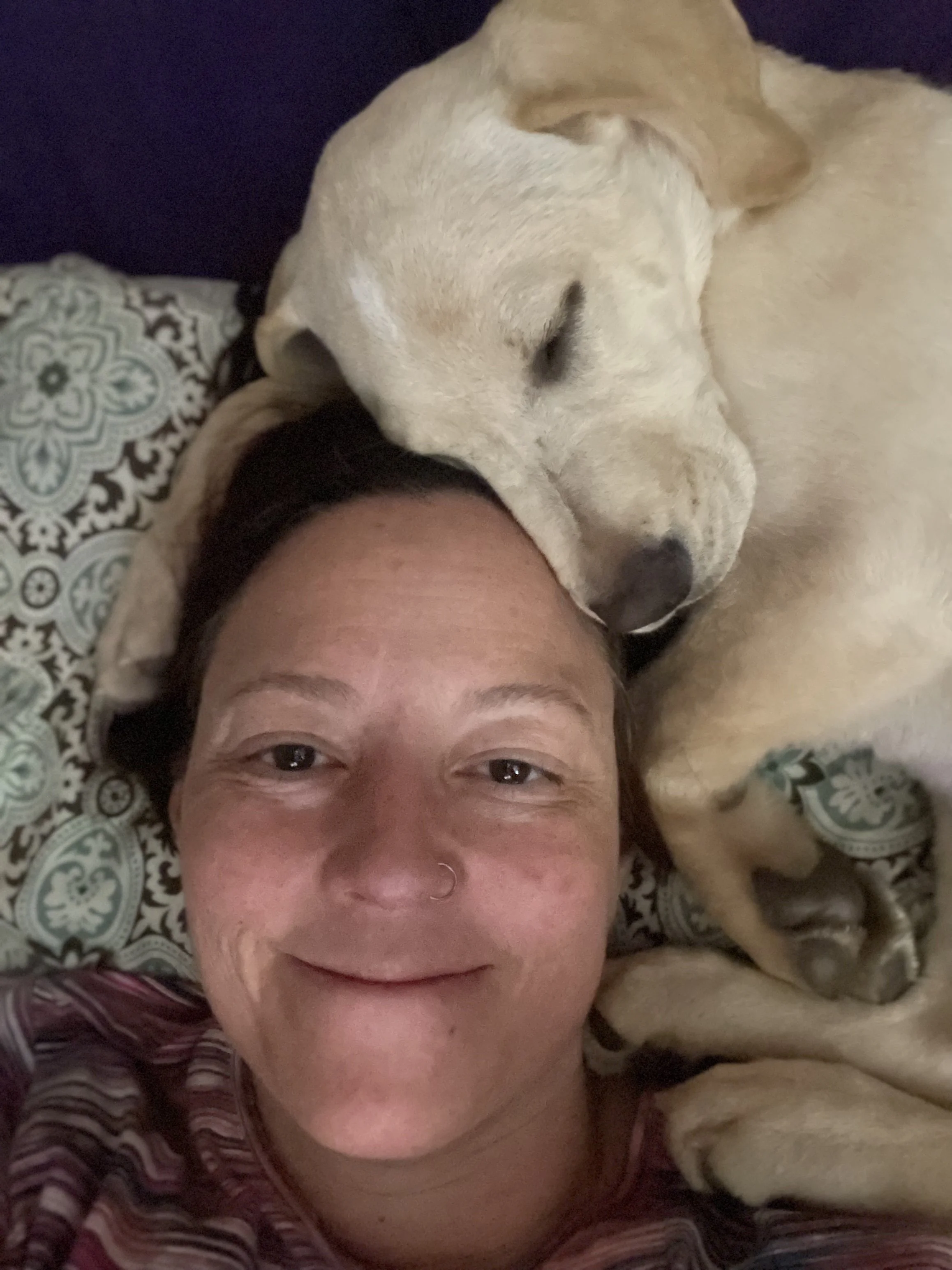 Falkor snuggling Tiffany's head