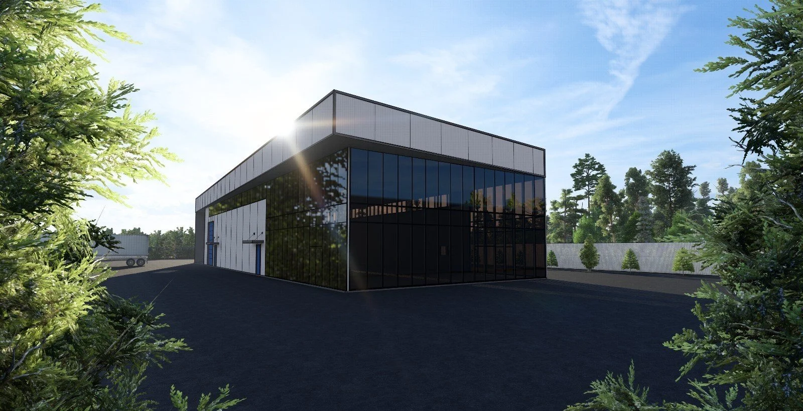 Modern industrial building with black glass walls, surrounded by greenery, paved driveway, and a clear sky in the background.