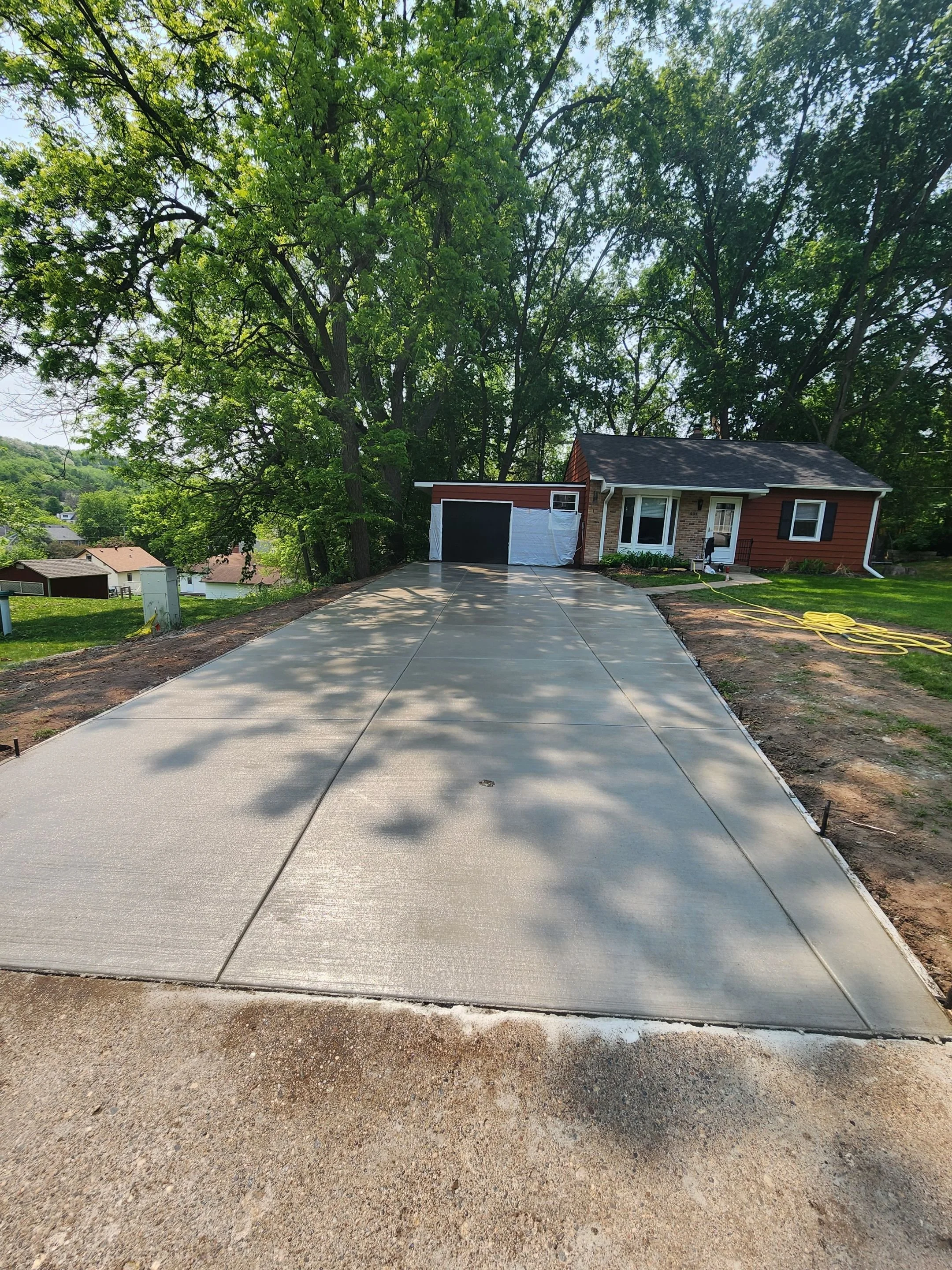 Concrete vs Asphalt Driveway in Minnesota | Honest Comparison