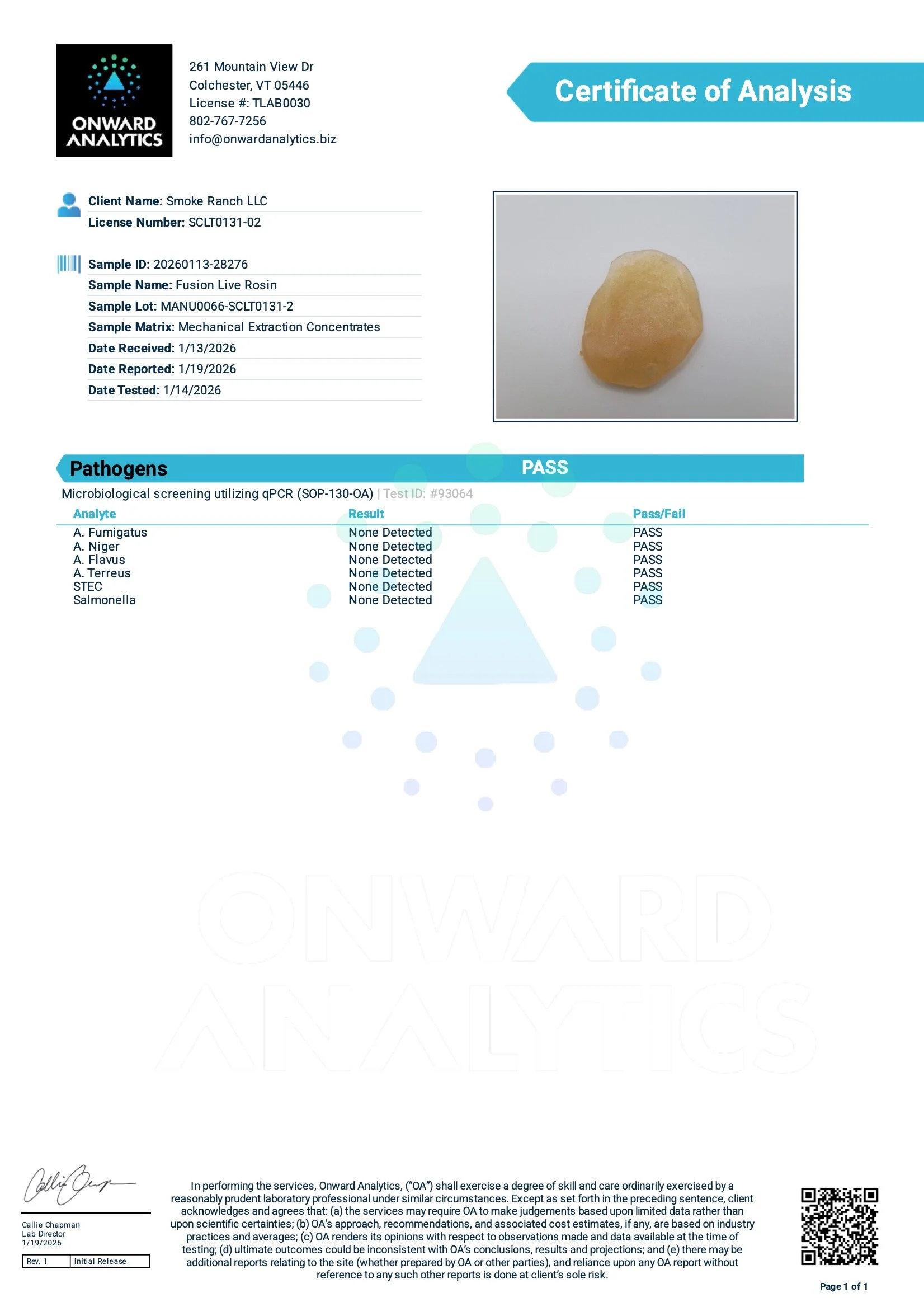 A yellowish, irregularly shaped stone or mineral specimen on a white background, part of a certificate of analysis document.