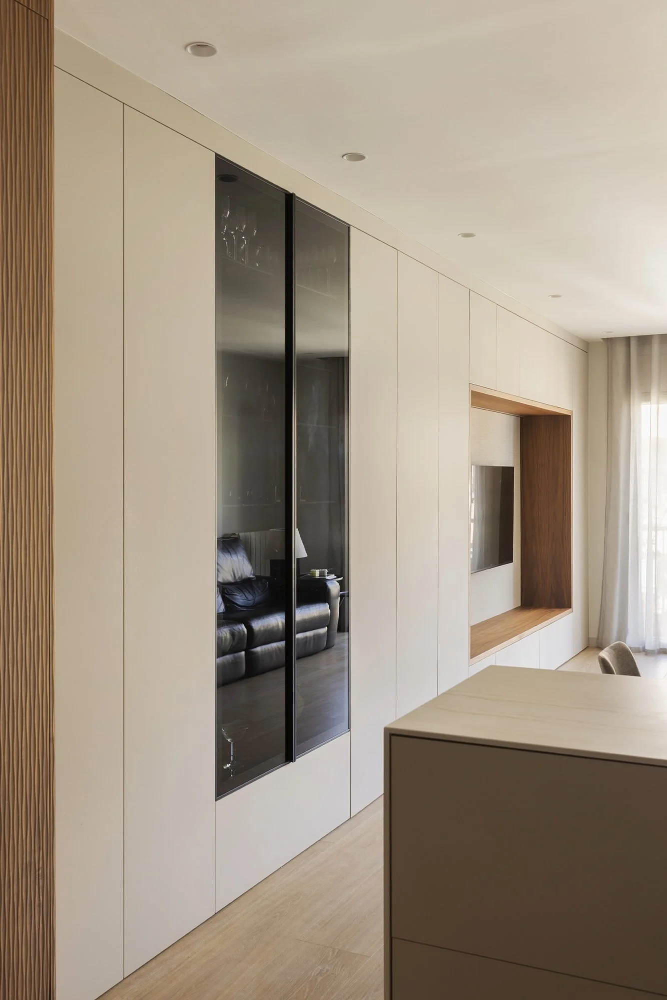 Harmonious integration of kitchen, dining, and living spaces in the Castillejos project by Alba Roca Studio..jpg