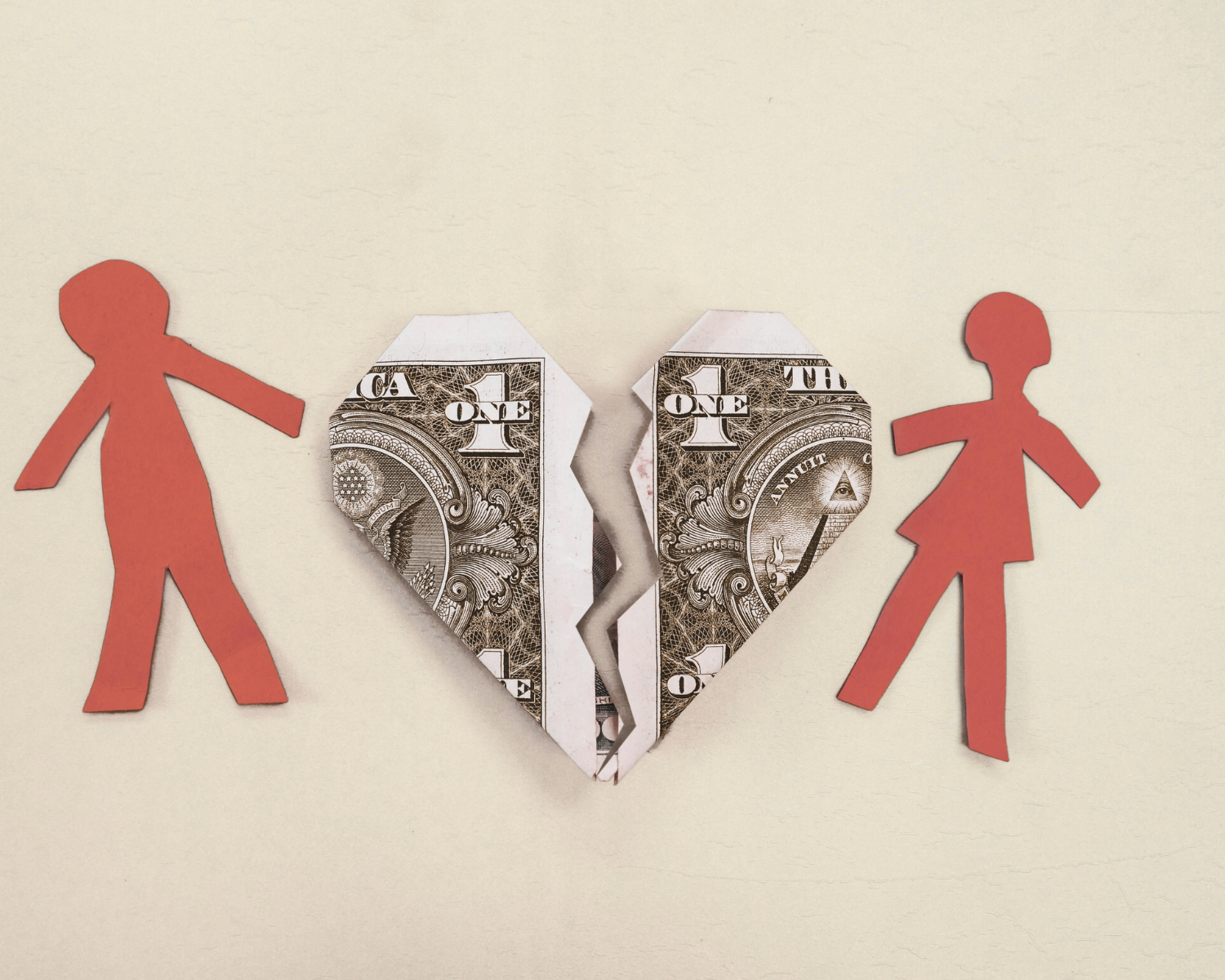 Illustration of two people separated by a broken heart made of money