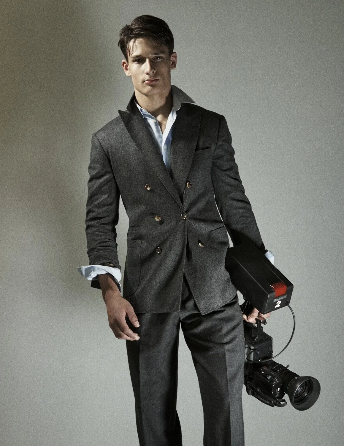 3_grey_suit_camera.jpg