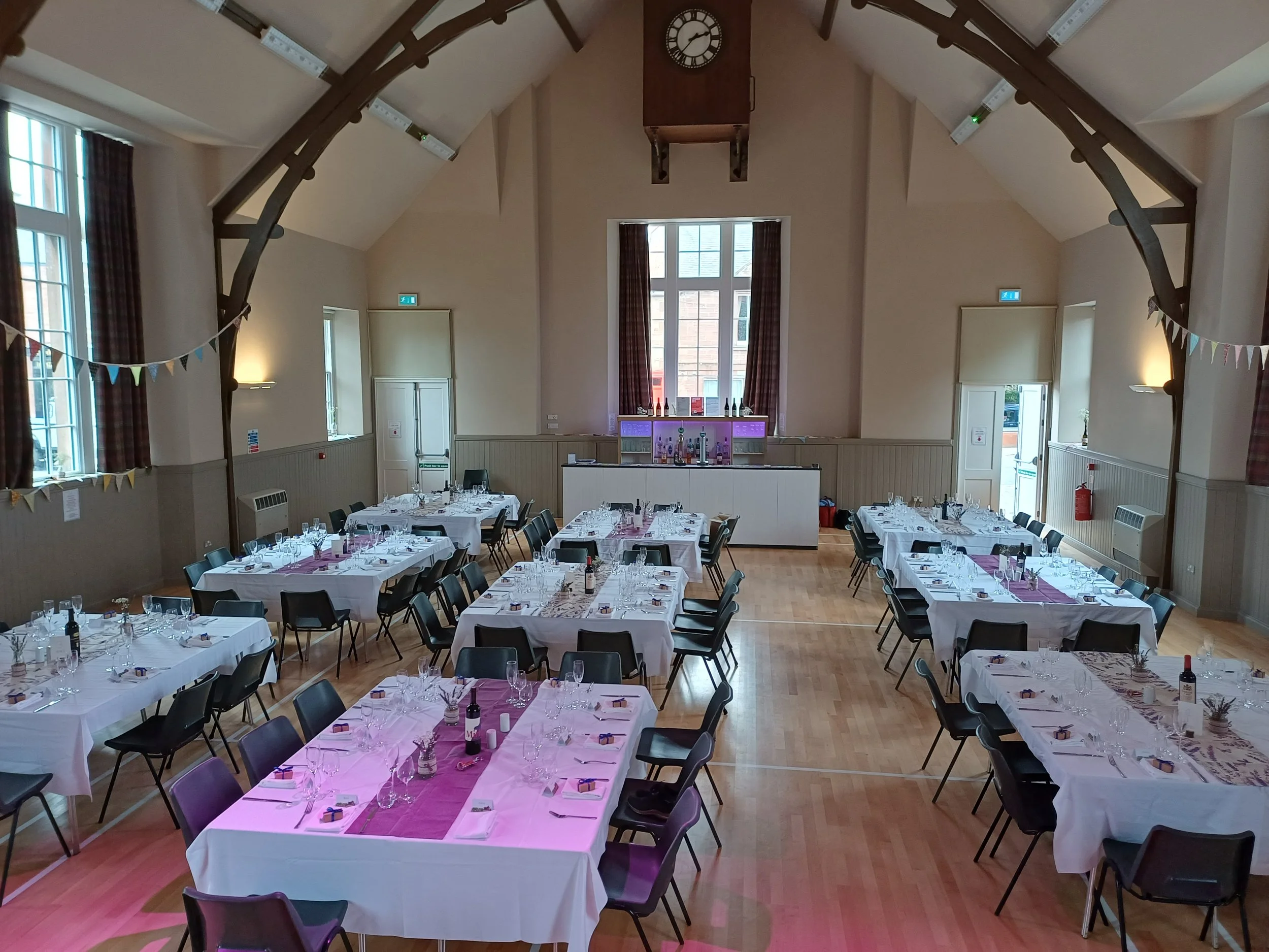 View of St Boswells village hall decorated for a wedding reception, where Taps Bar and Events provided the pop-up mobile bar.