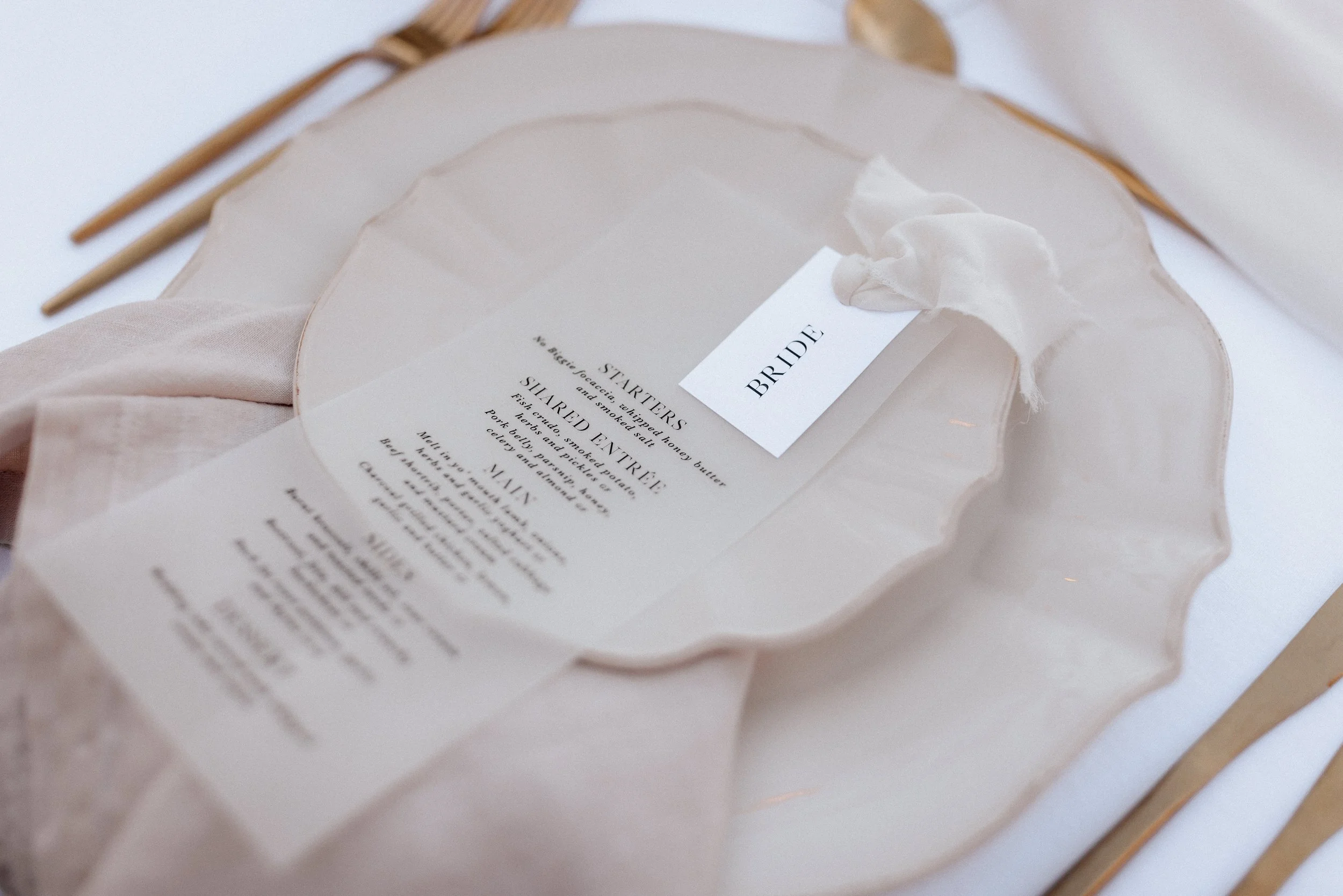 Modern vellum transparent wedding menu with placecard and ribbon