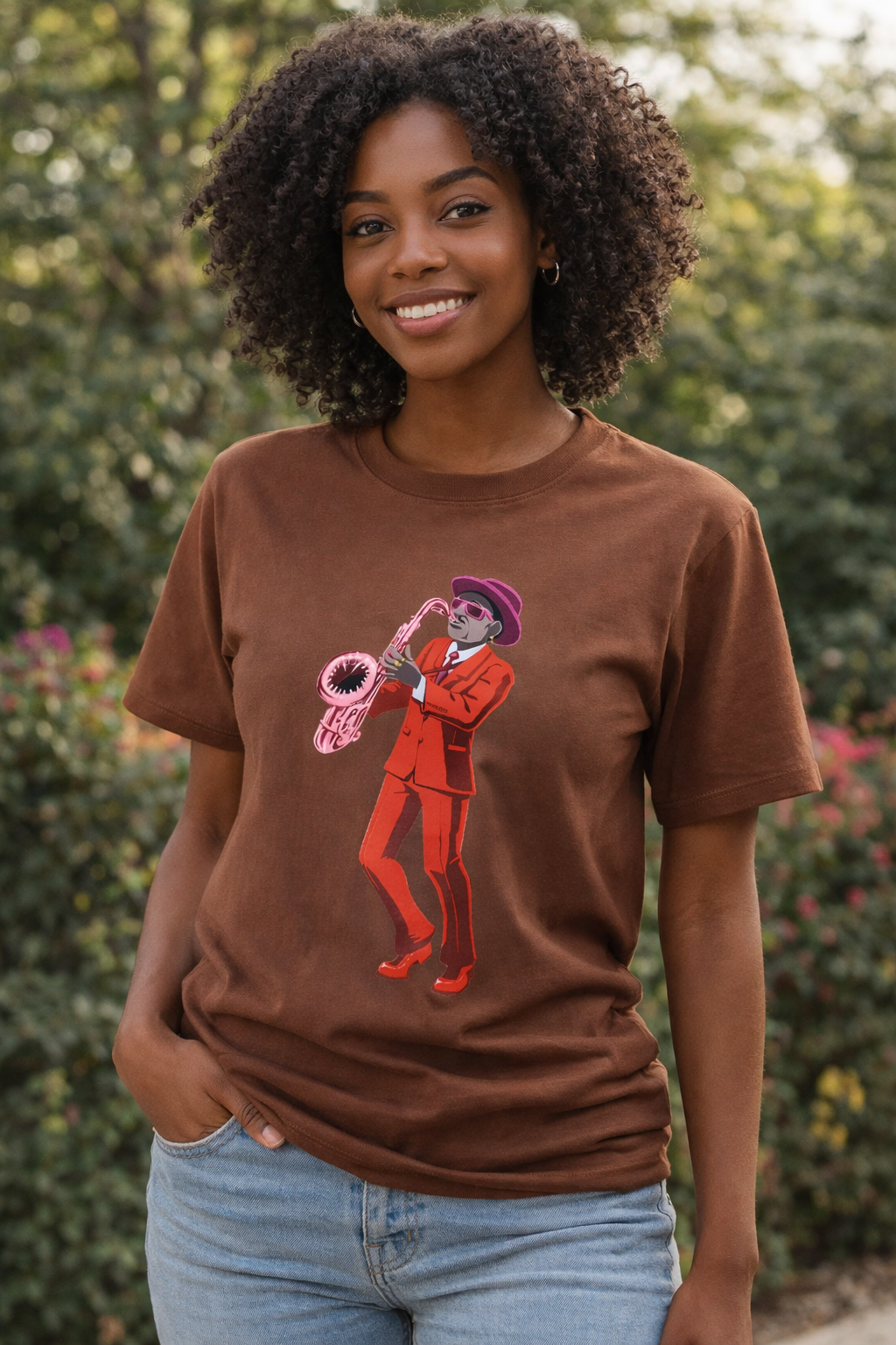 Smiling woman in graphic jazz T-shirt.png