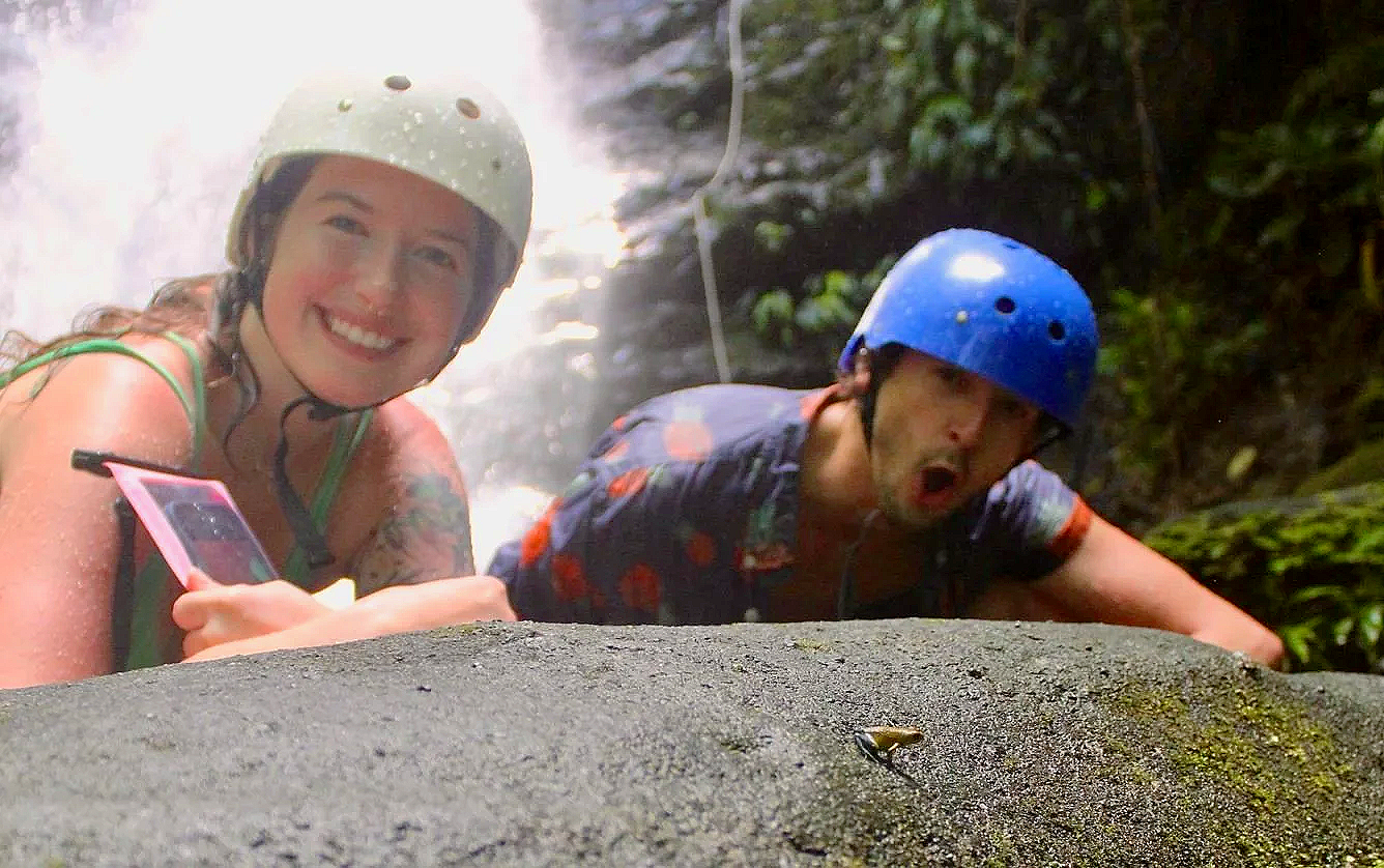 people+looking+at+poison+dart+frog+in+jungle+quepos+canyoning+costa+rica.png