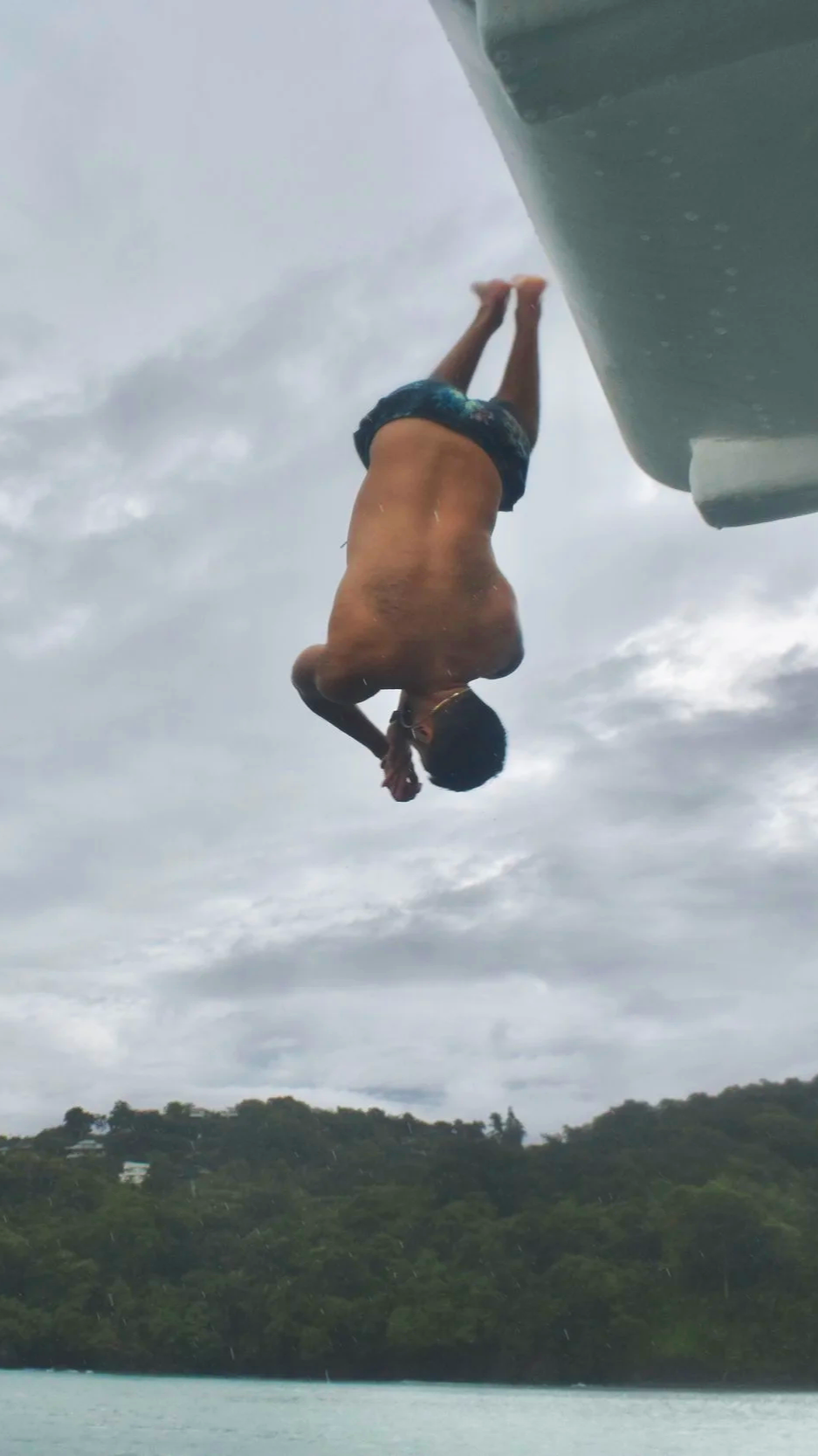 michael+doing+flip+into+water+at+sea+quest+catamaran+costa+rica.png