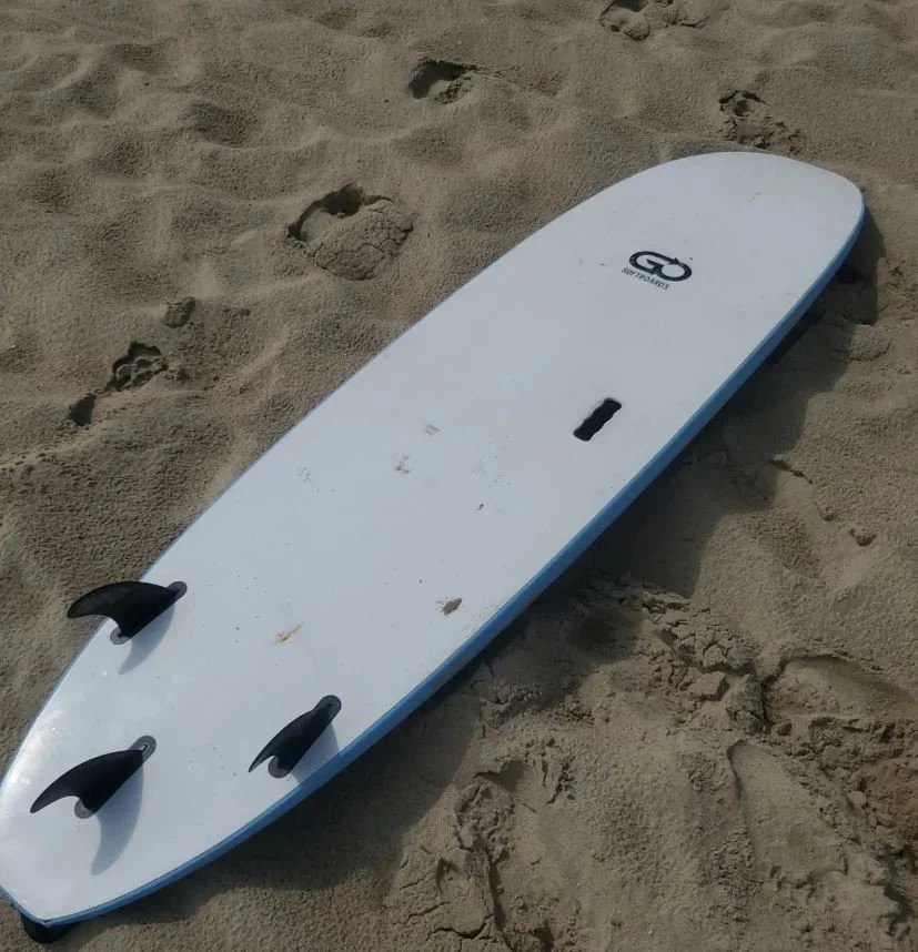 9ft foam surfboard from natural art surf rentals buxton.JPG