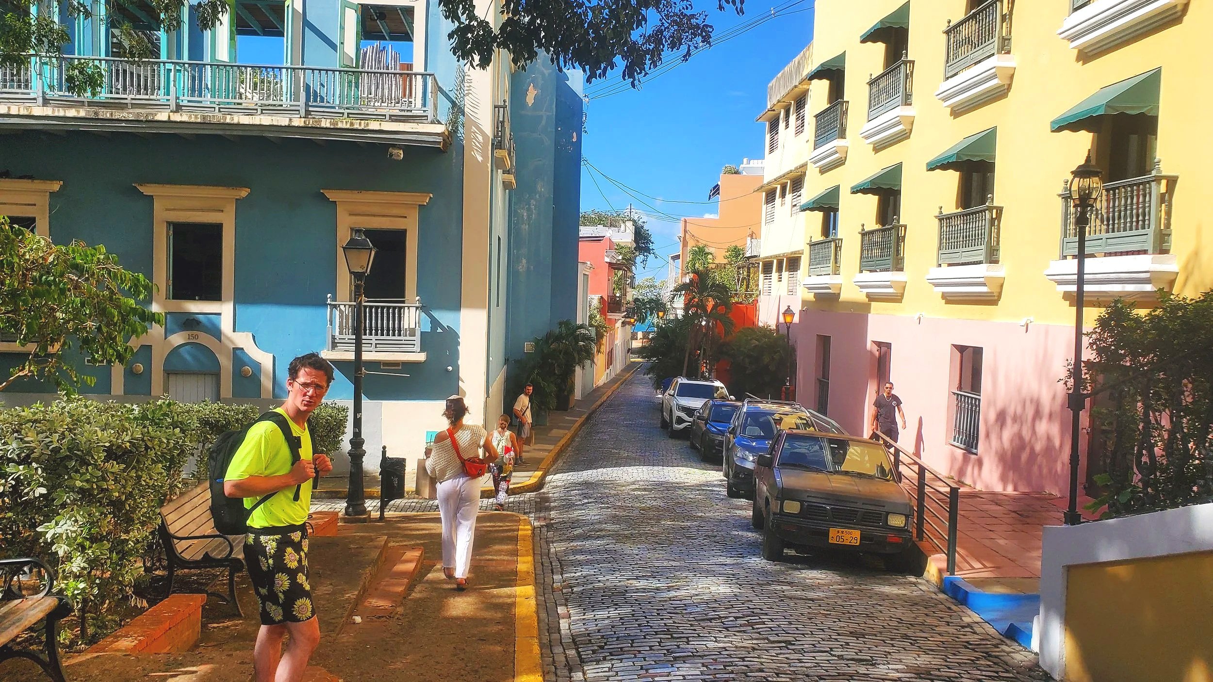 walking through pastel buildings san juan puerto rico