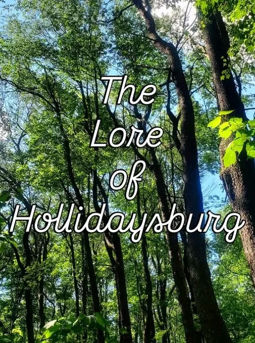 the lore of hollidaysburg text over pic of trees with clear blue sky.JPG
