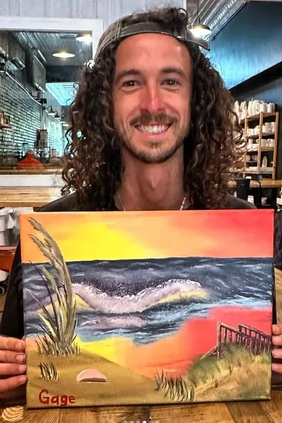 gage with finished oil painting of ocean isle seascape.JPG