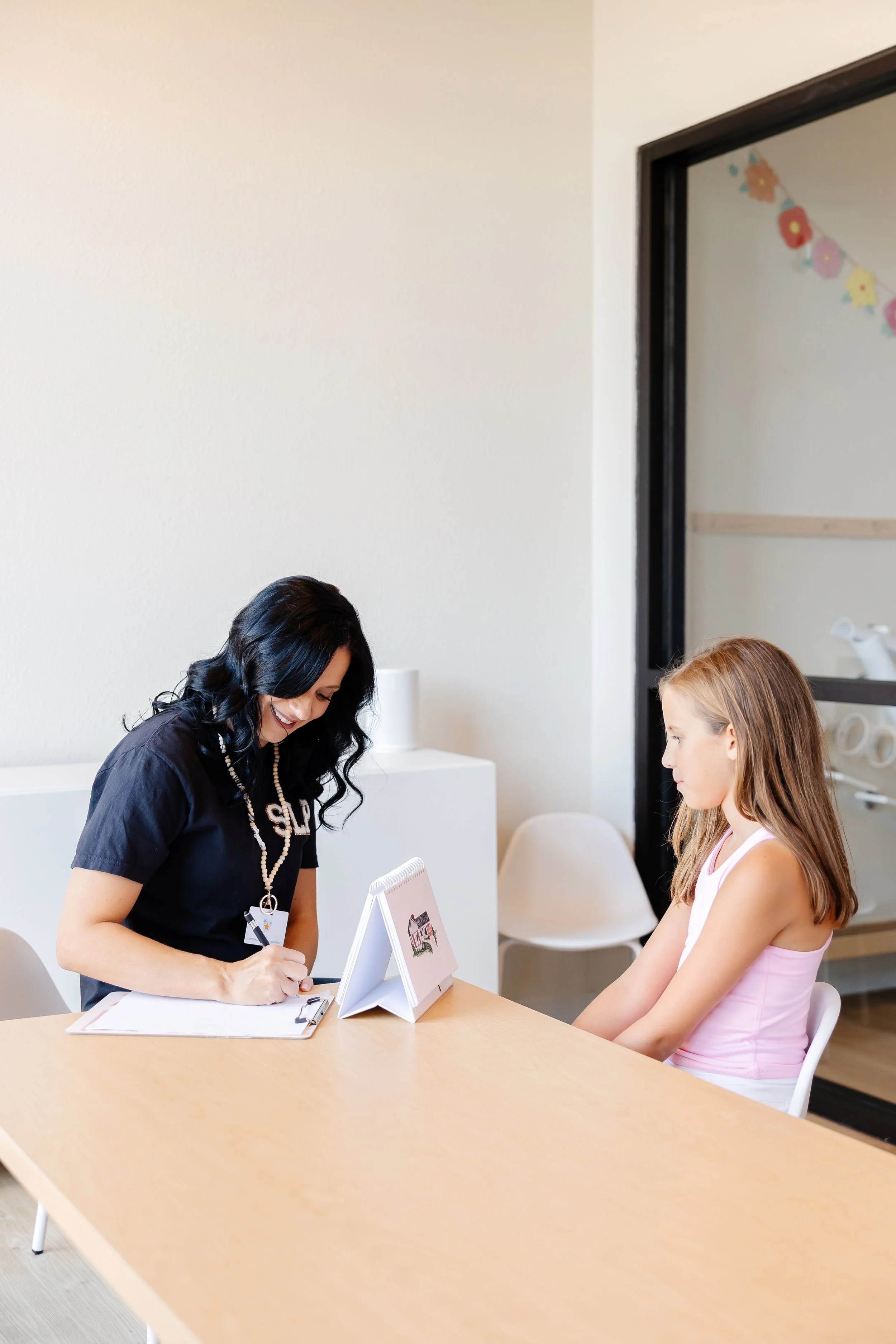 woman evaluating a child