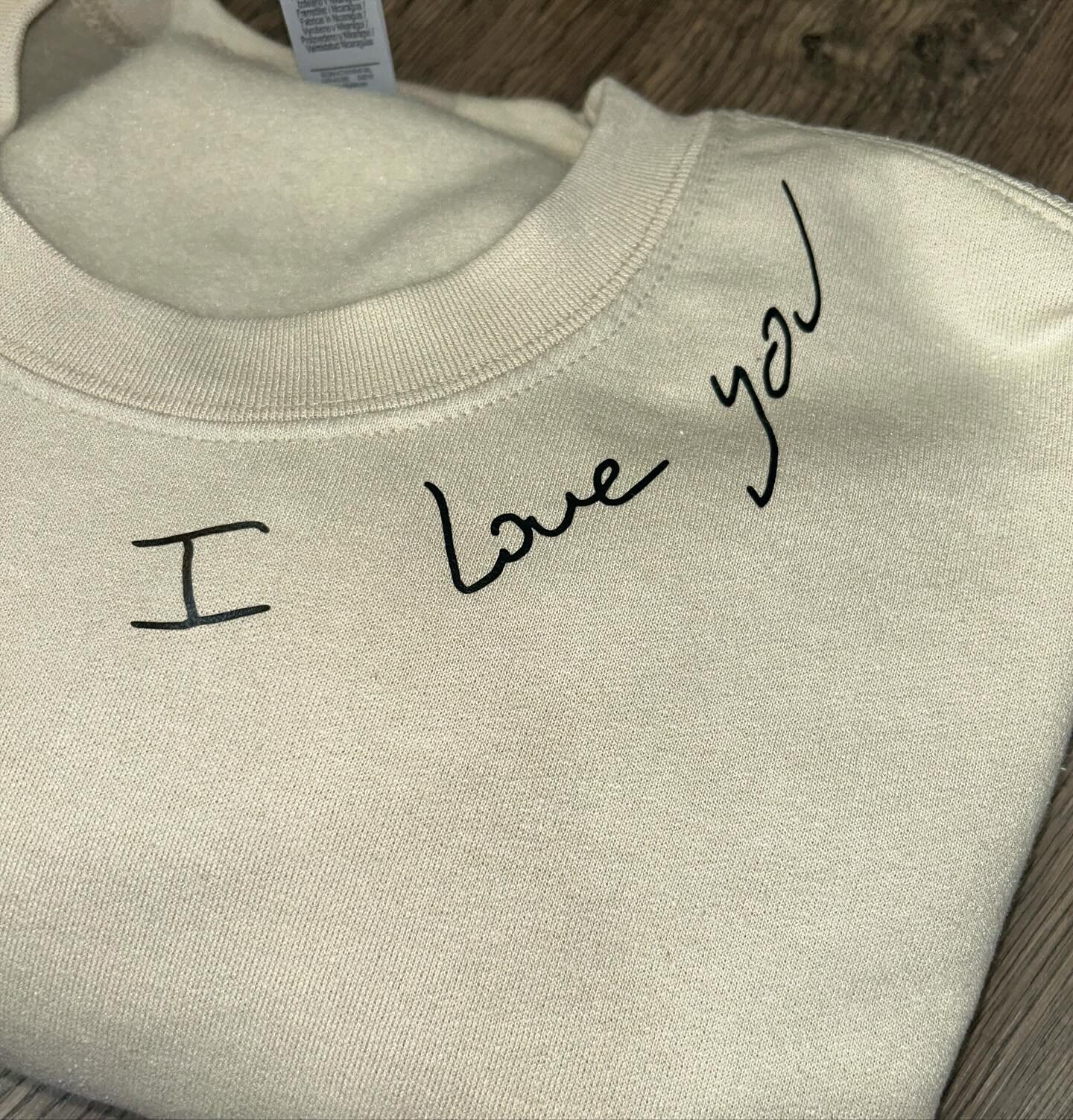 This crew neck has always meant something special to me. That&rsquo;s why I names it &ldquo;Close to the Heart&rdquo;. When my customer reached out and asked to put their loved ones handwriting on it, I said yes, as fast as I could type. If you have 