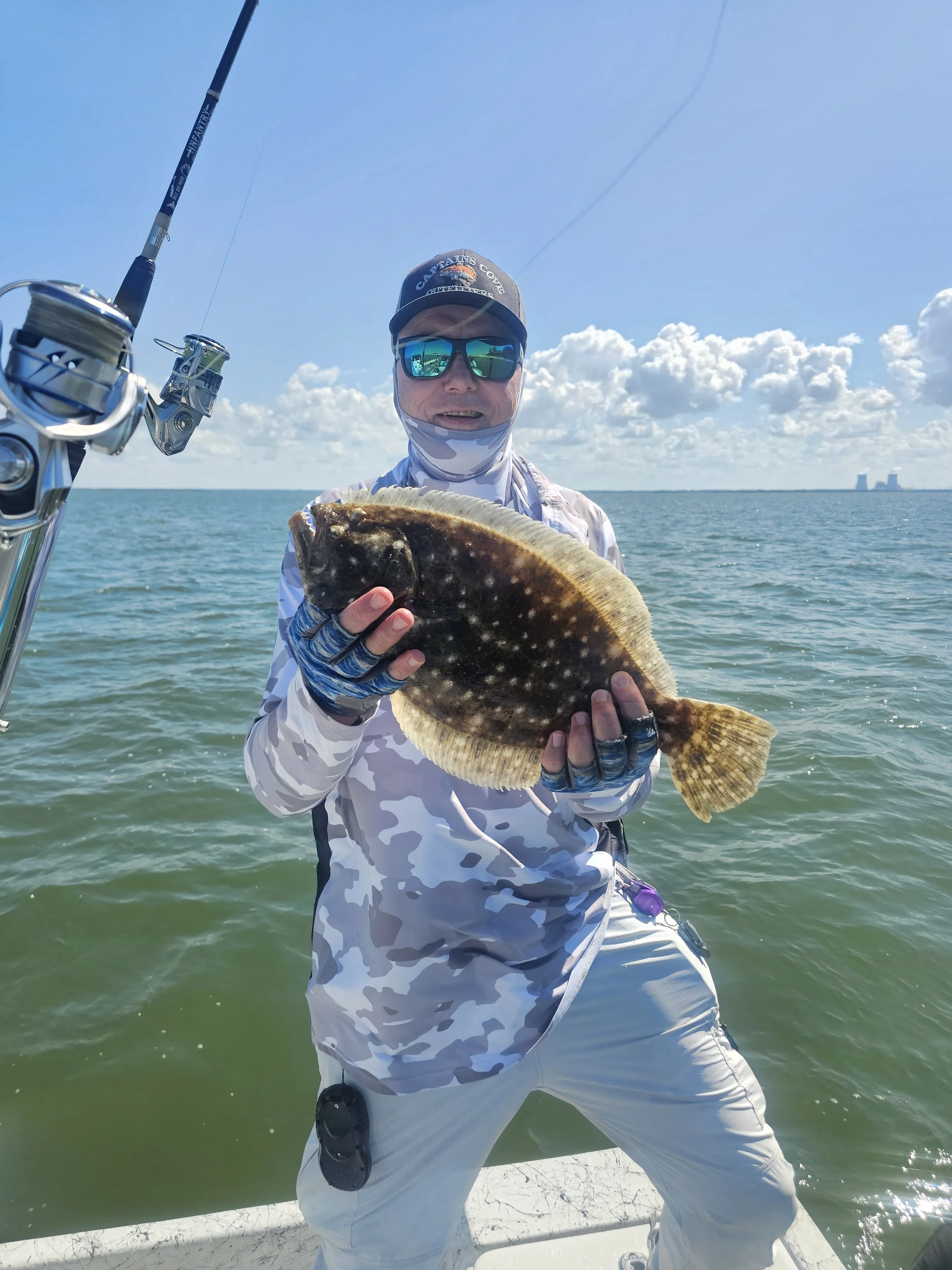 gods country capt mike nice flounder.jpg