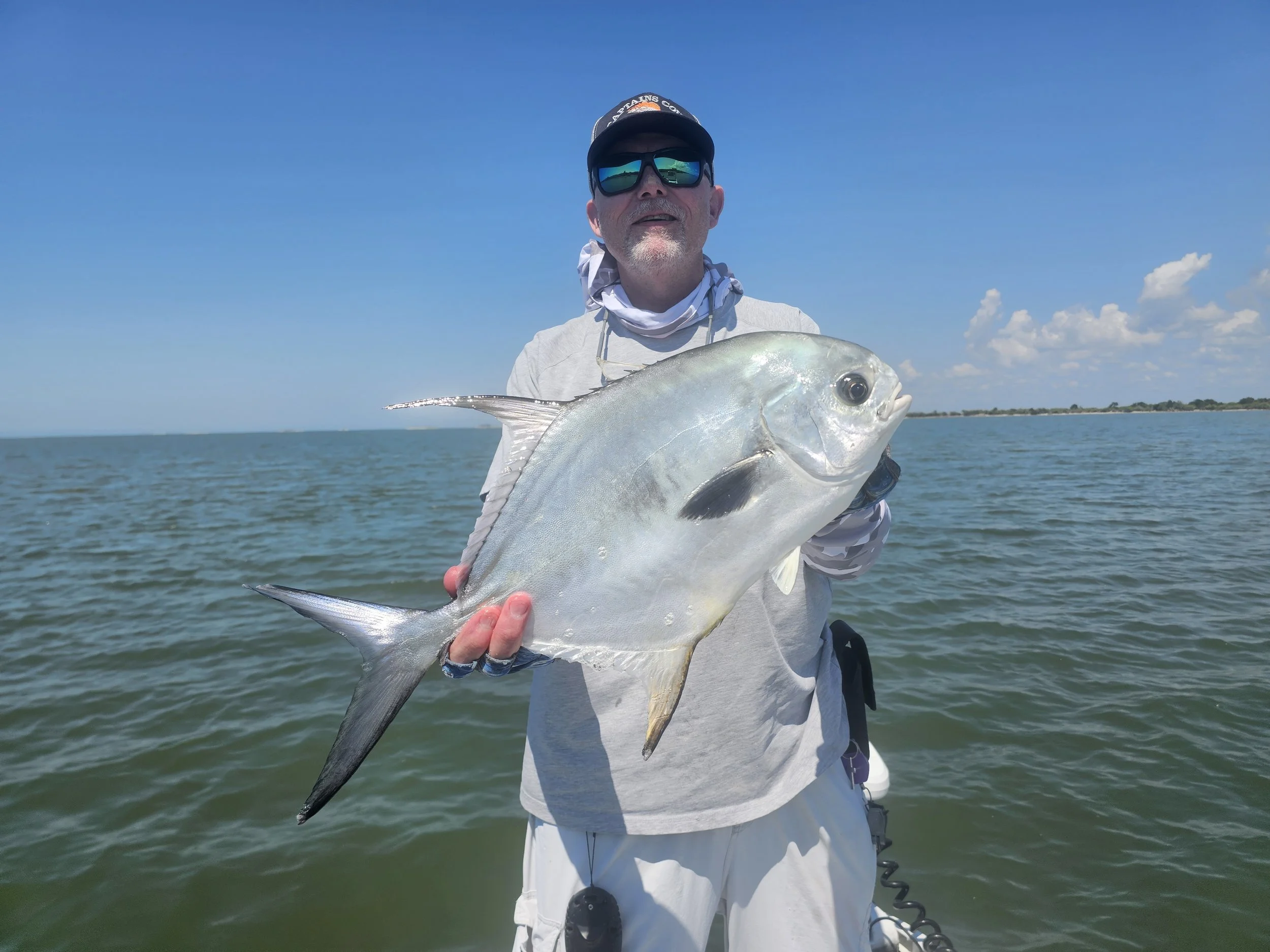 gods country capt mike BIG permit.jpg