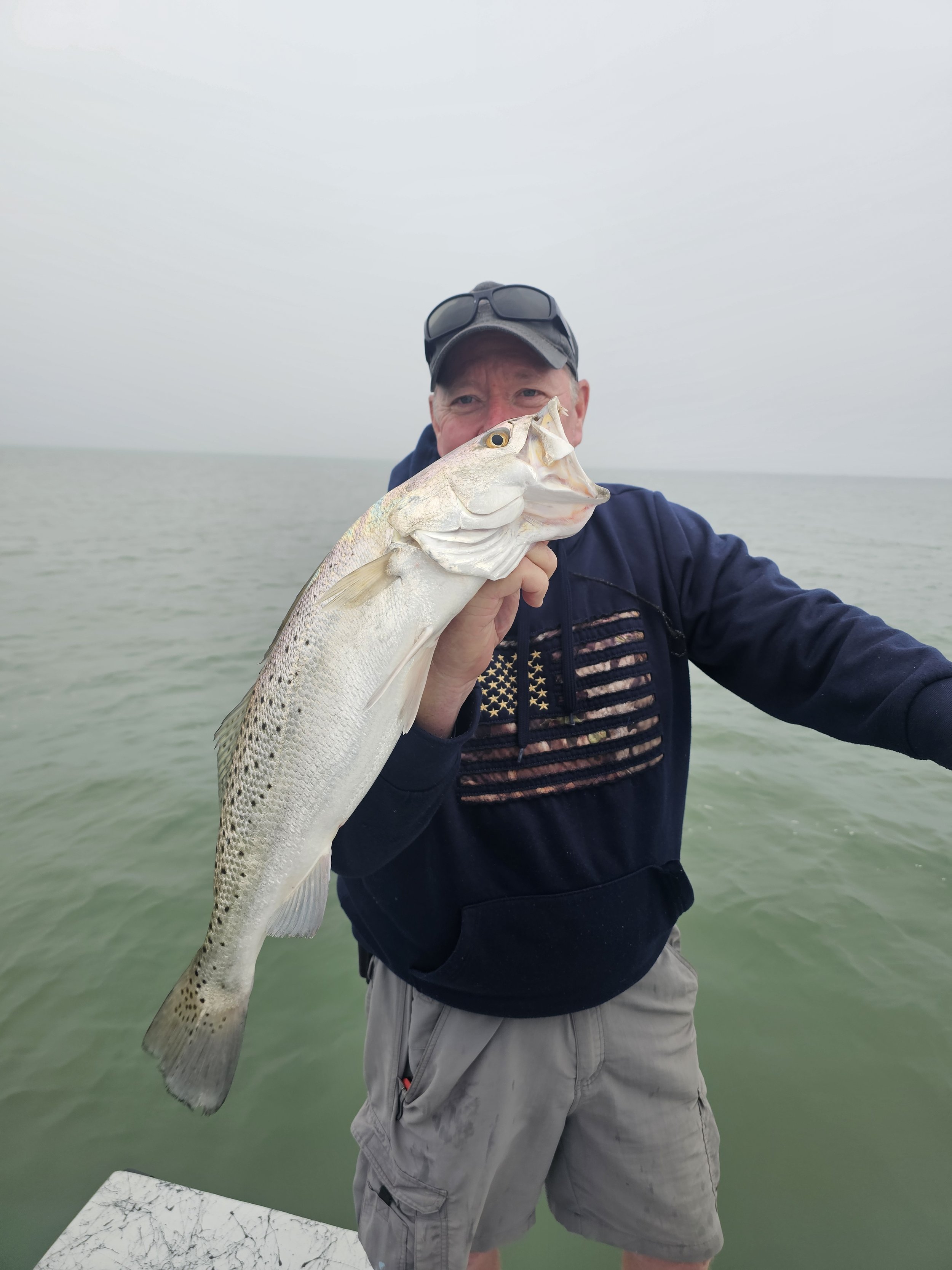 gods country mark beam big trout.jpg