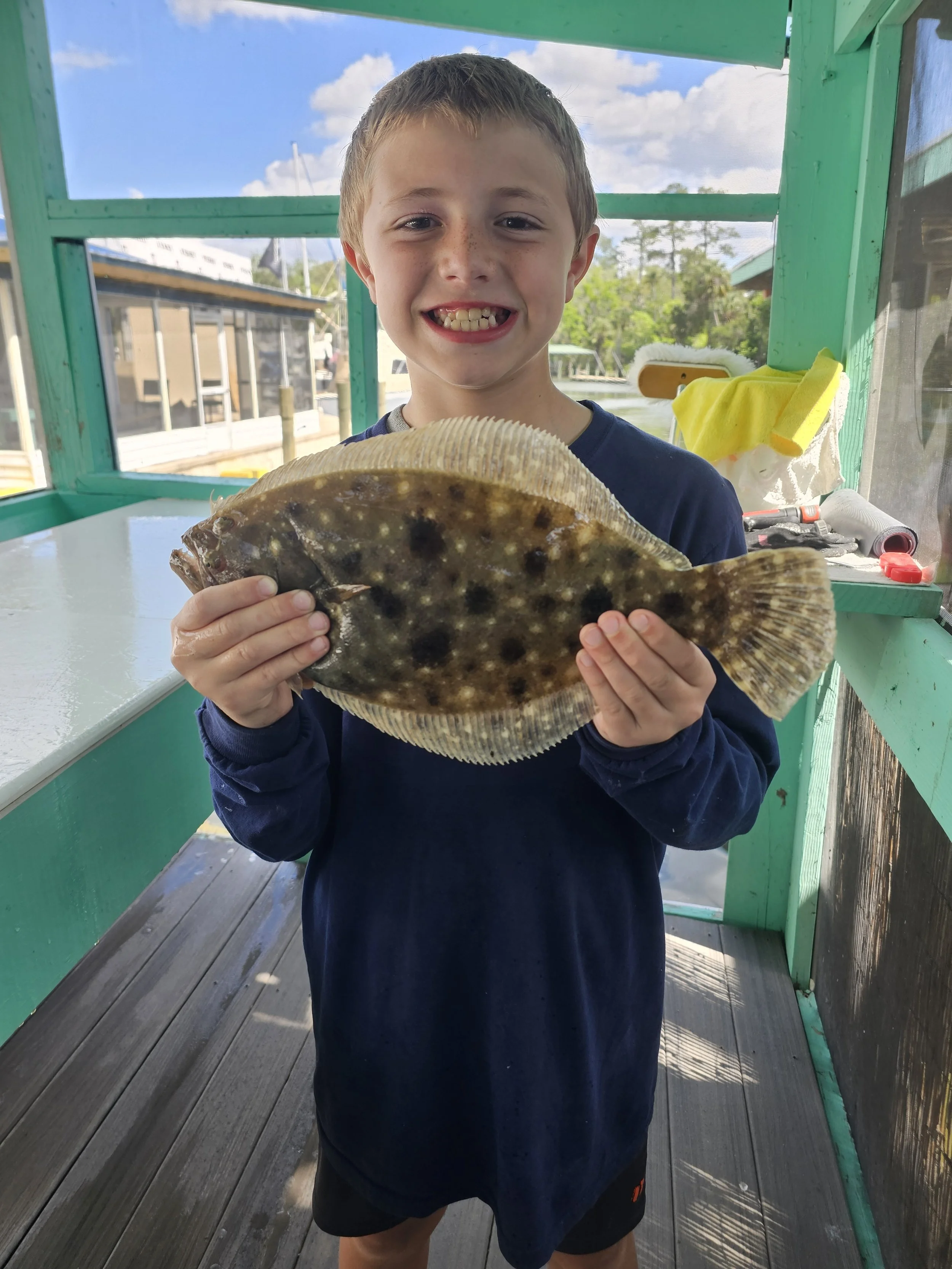 gods country jason and carter flounder.jpg
