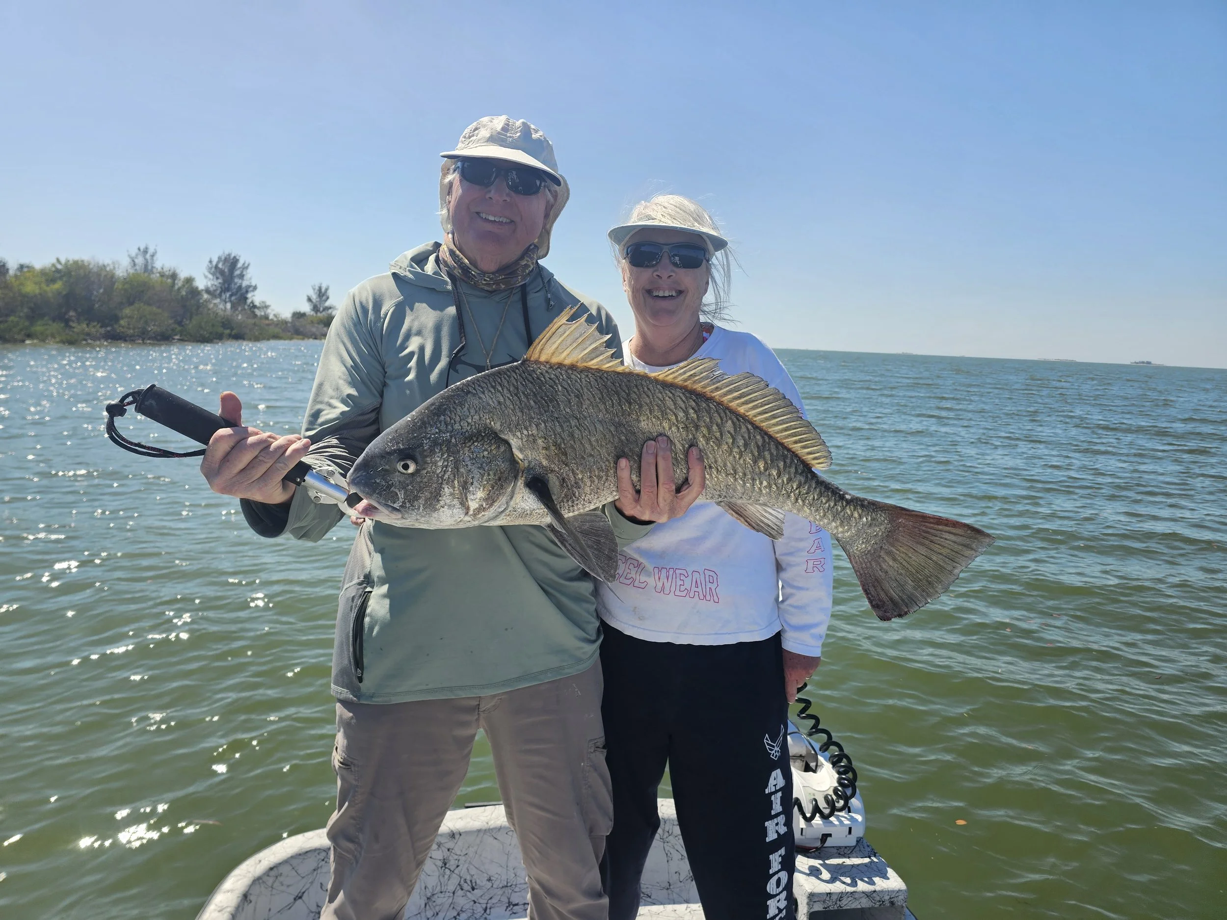 gods country tom sharon together big drum.jpg
