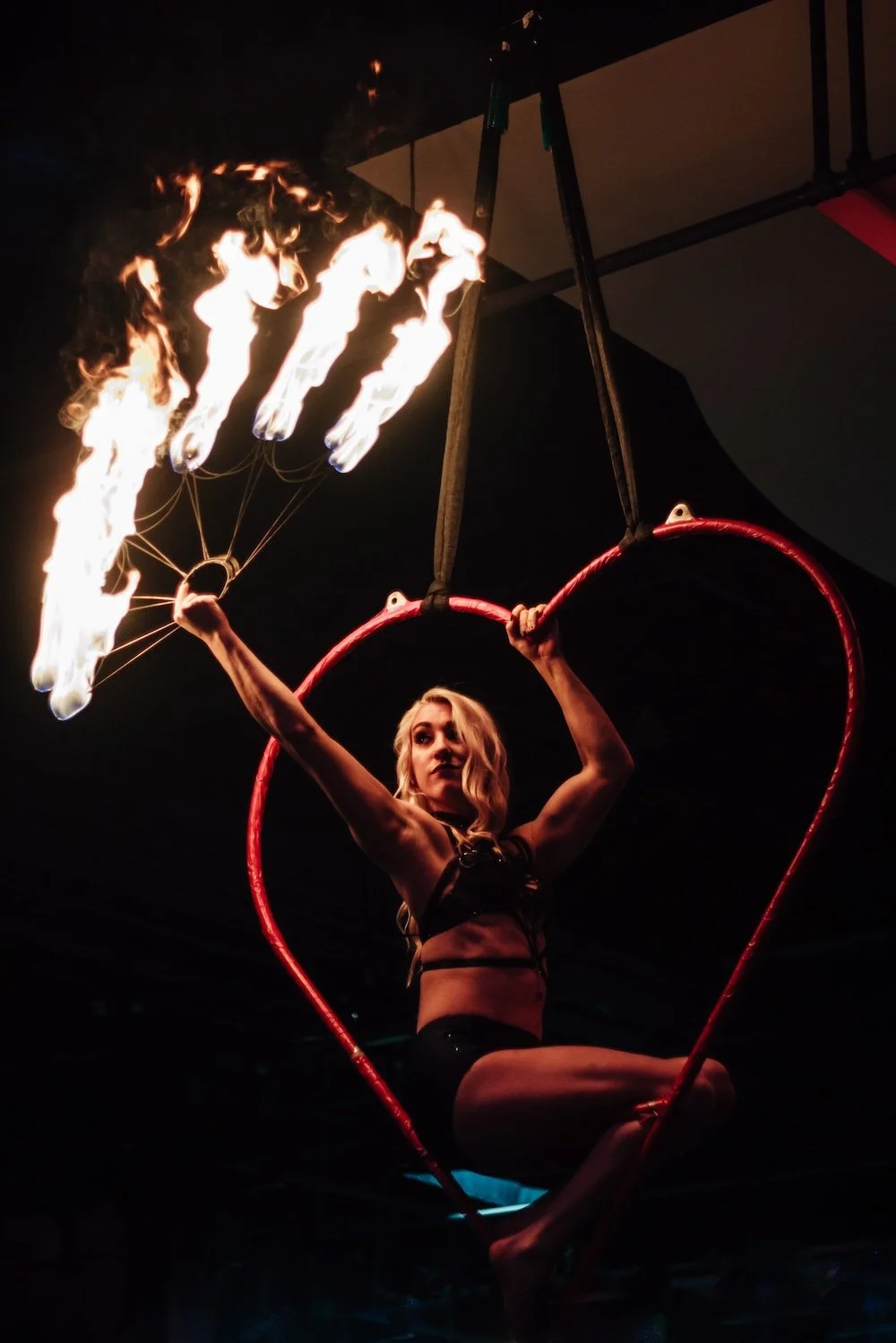 Aerial heart Aerialist performer with fire