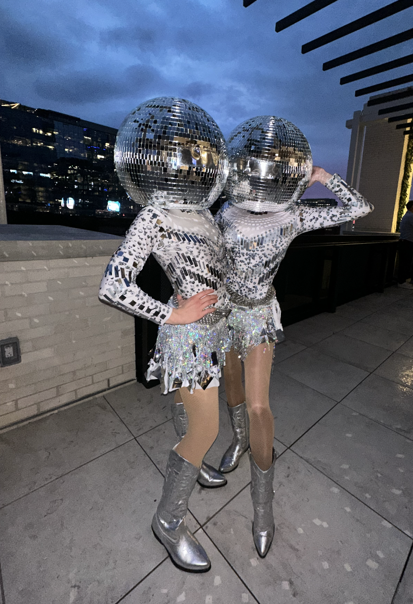 Disco Ball Dancers on a rooftop