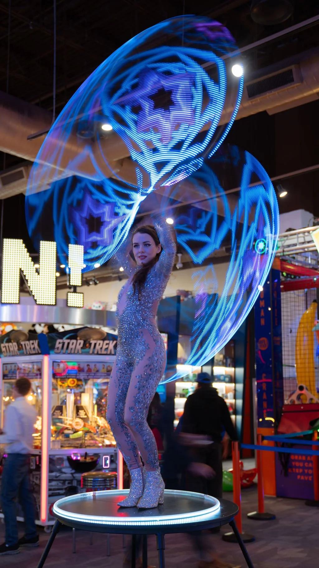 LED hula hoop performer entertaining guests at a Nashville-themed corporate grand opening.