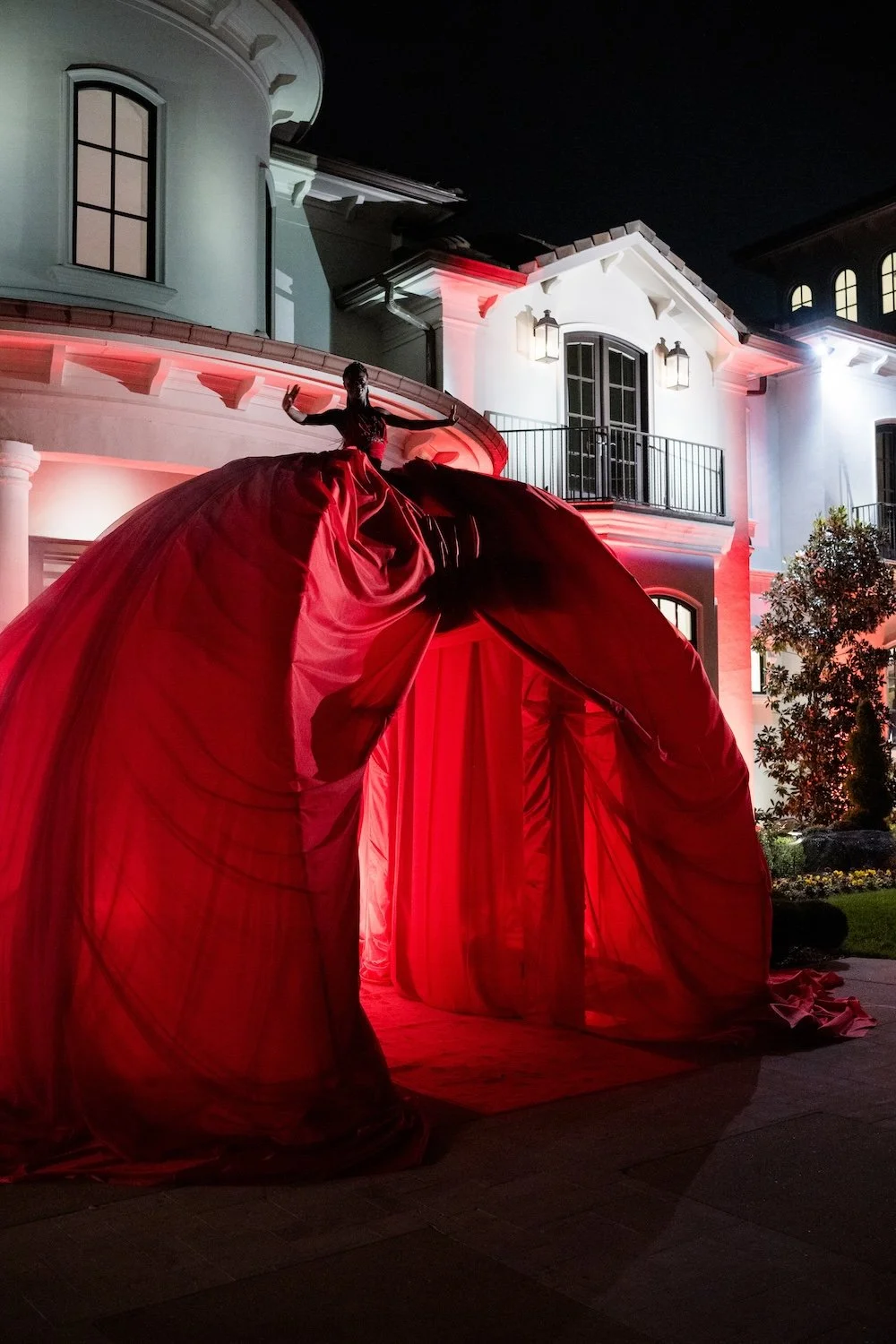 Giant entrance with performer on top circus tent topper