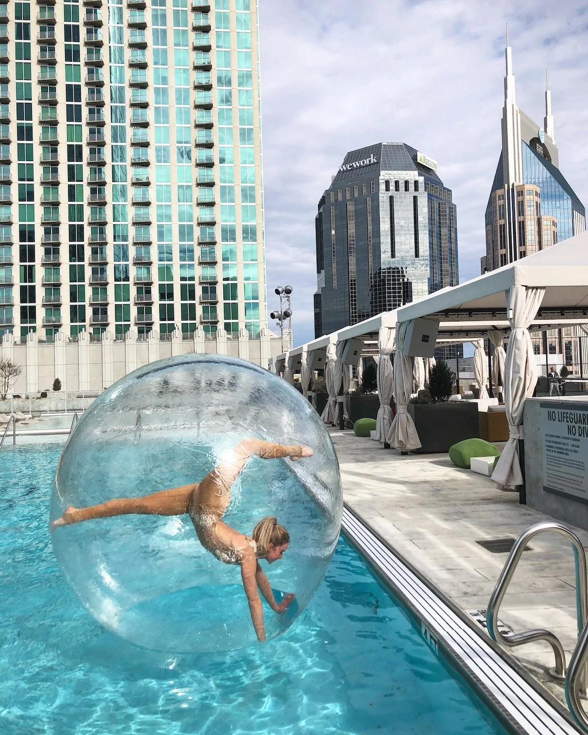 Pool party entertainment bubble performers on pool in Nashville