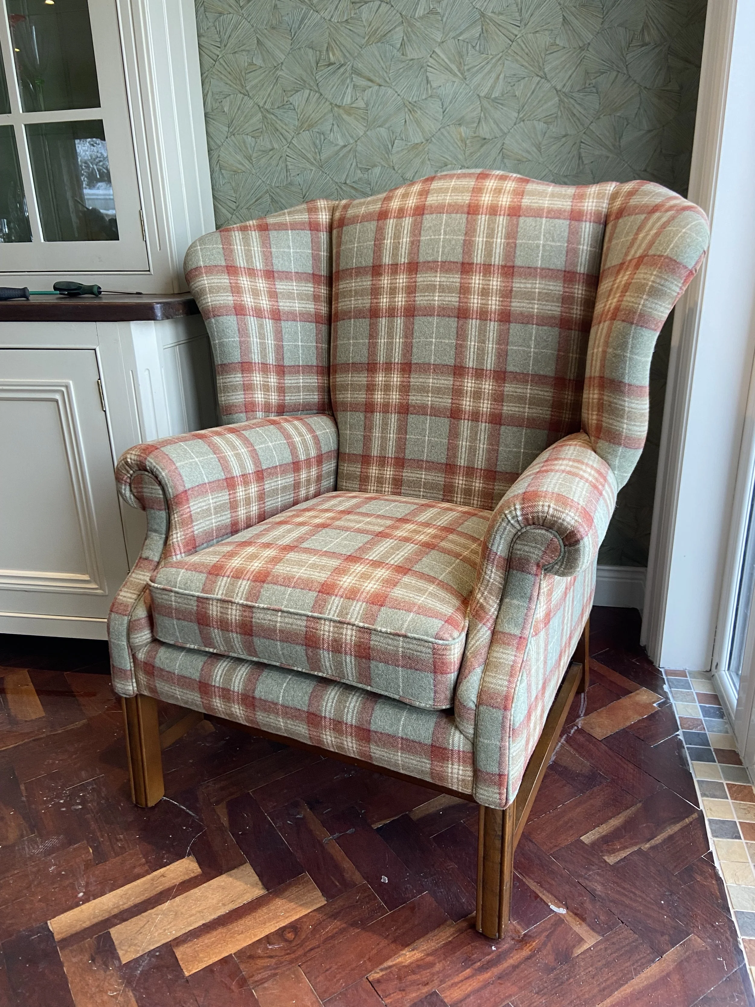winged backed fireside armchair